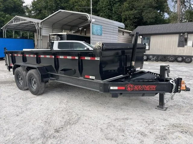 New Southern Utility 7x16 tandem-axle dump trailer with tarp on the A&A Center Trailers lot in Jonesboro, GA