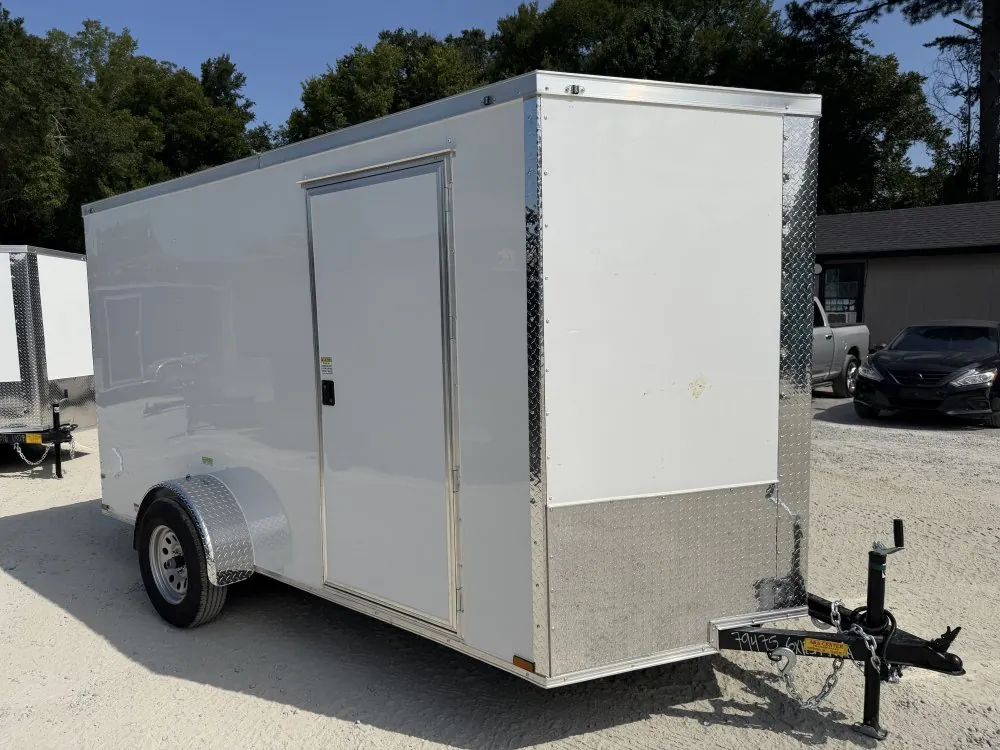 New Quality Cargo 6x12 enclosed cargo trailer with side door on the A&A Center Trailers lot in Jonesboro, GA